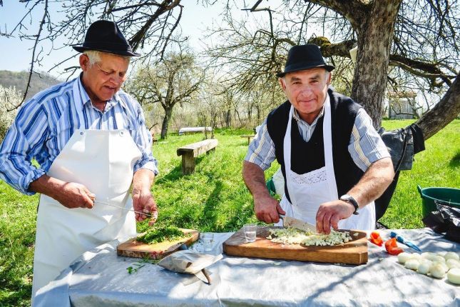 Local hosts preparing the food.