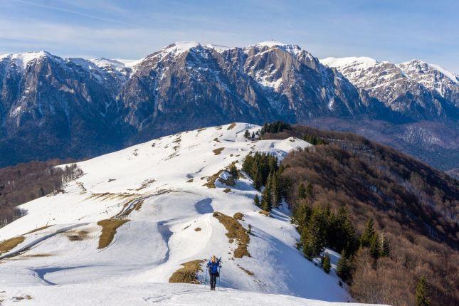 Hiking on the ridge of the mountain during winter time